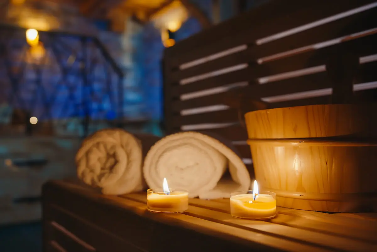 Cozy sauna ambiance with lit candles