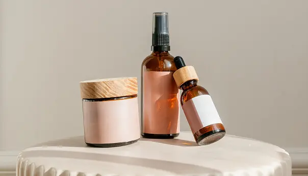 Cosmetic bottles on a round table