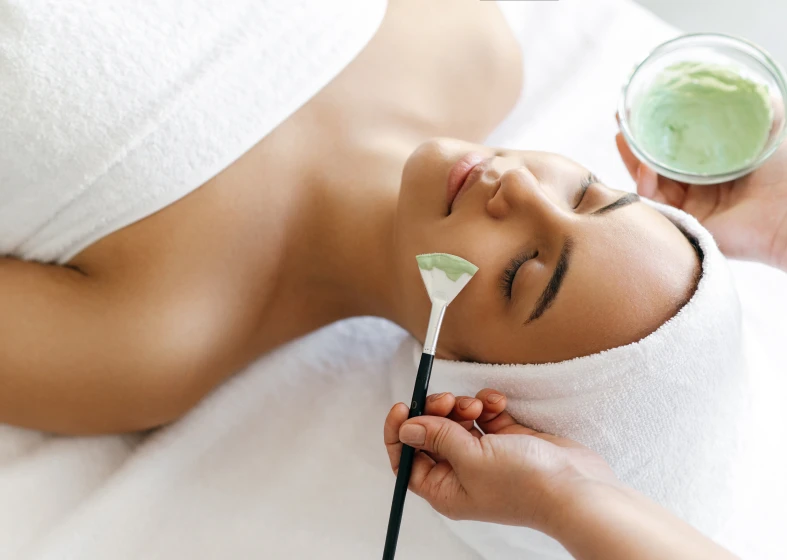Relaxing skincare session with brush application